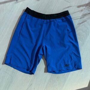 Reebok Men's Blue Athletic Speedwick Shorts with Black Waistband